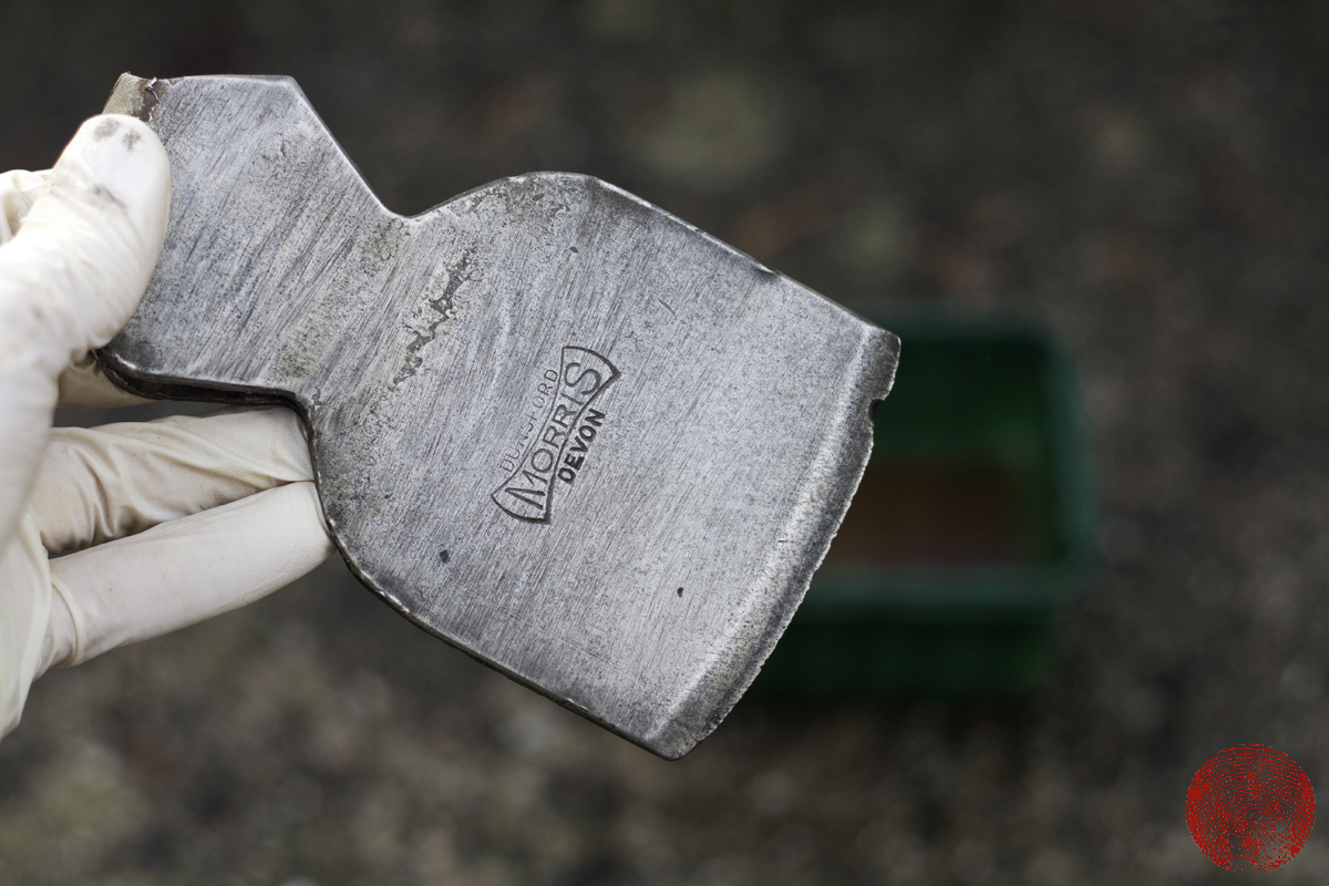 axe head showing hamon line after vinegar bath