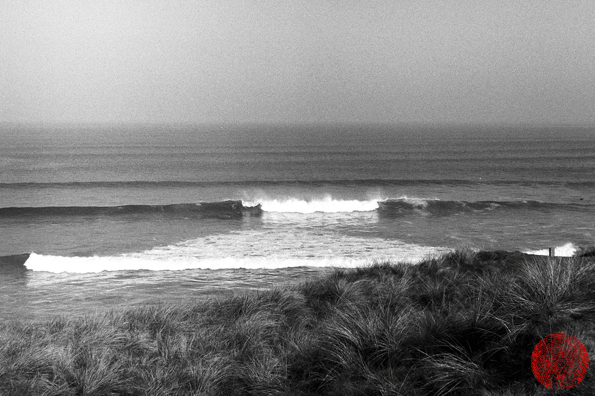 waves breaking at gwithian beach, cornwall, shot with a zorki 4k rangefinder vintage camera