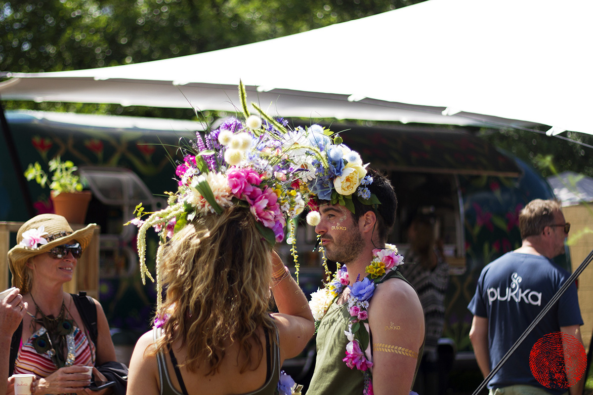 festival-goers wearing flower garlands at somersault festival 2015